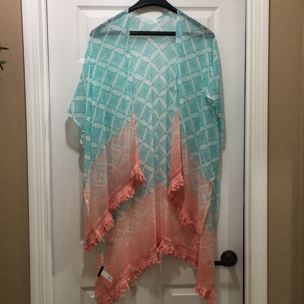 Ruana wrap teal and coral with silver stitching